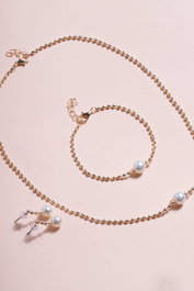 Heliophilia Silver Conjunto de collar y pulsera de metal Dorado
